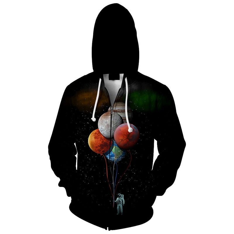 astronaut holding baloon planets
